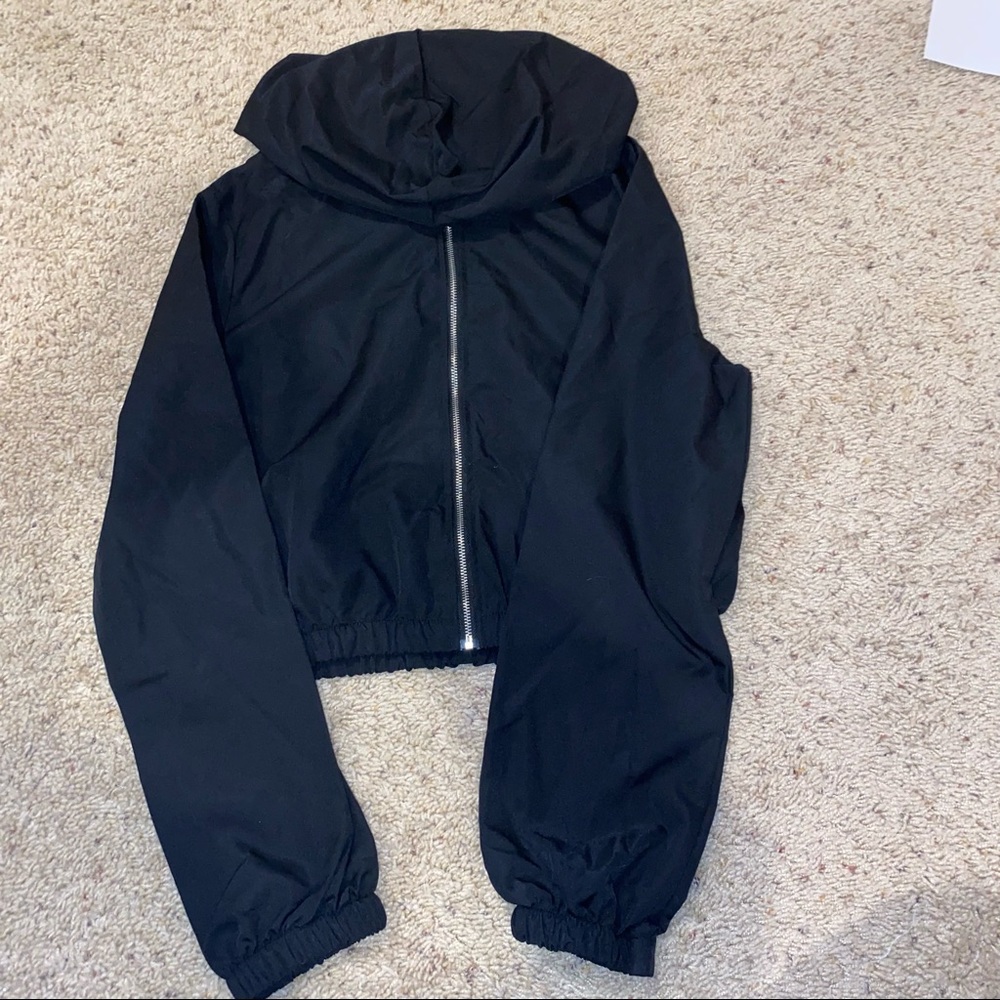 Cropped black with gold zip up jacket size medium romwe. Never worn (no tags).